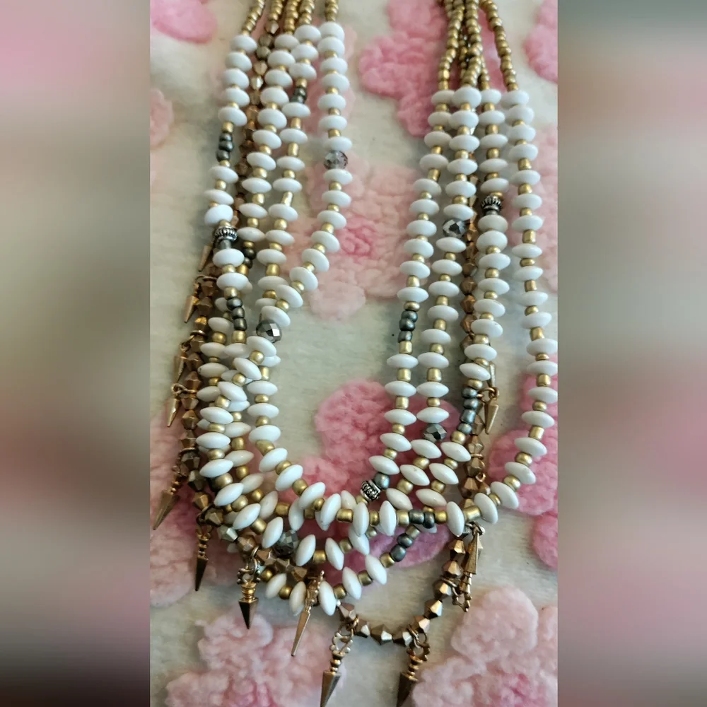 Plunder Necklace Multistrand white saucer, gold, silver beads, gold spiky drops